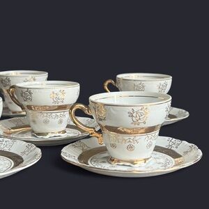 Set of 5 Sterling China Gold and White Demitasse Cups and Saucers made in Japan